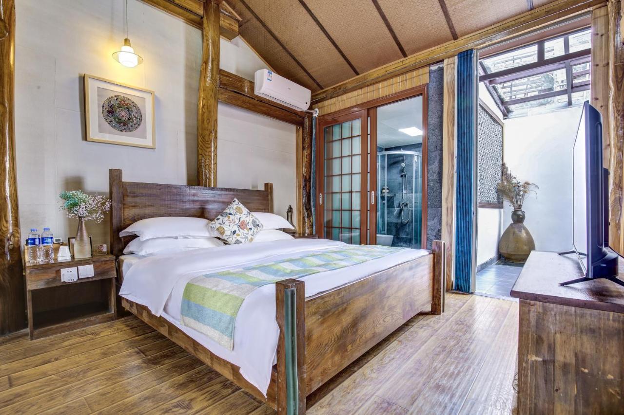 Dream Bay Hotel Tengchong Bagian luar foto
