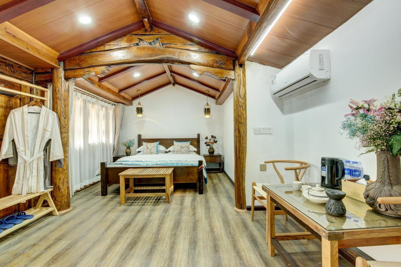 Dream Bay Hotel Tengchong Bagian luar foto